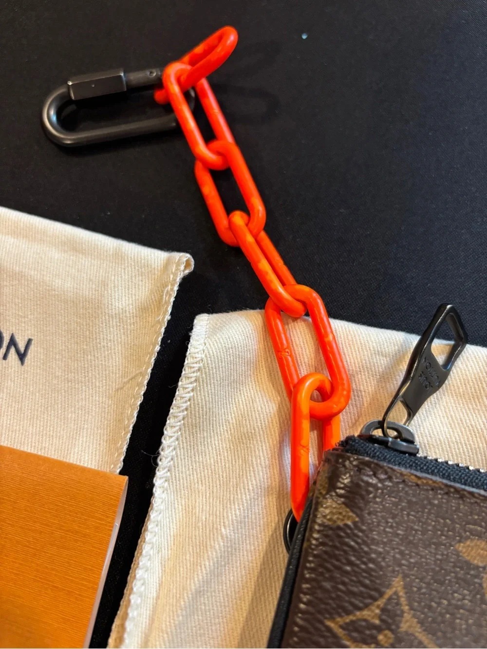 Louis Vuitton Brown Monogram Pouch with Bright Orange Chain